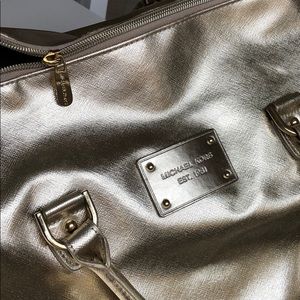 Michael Kors duffle bag.